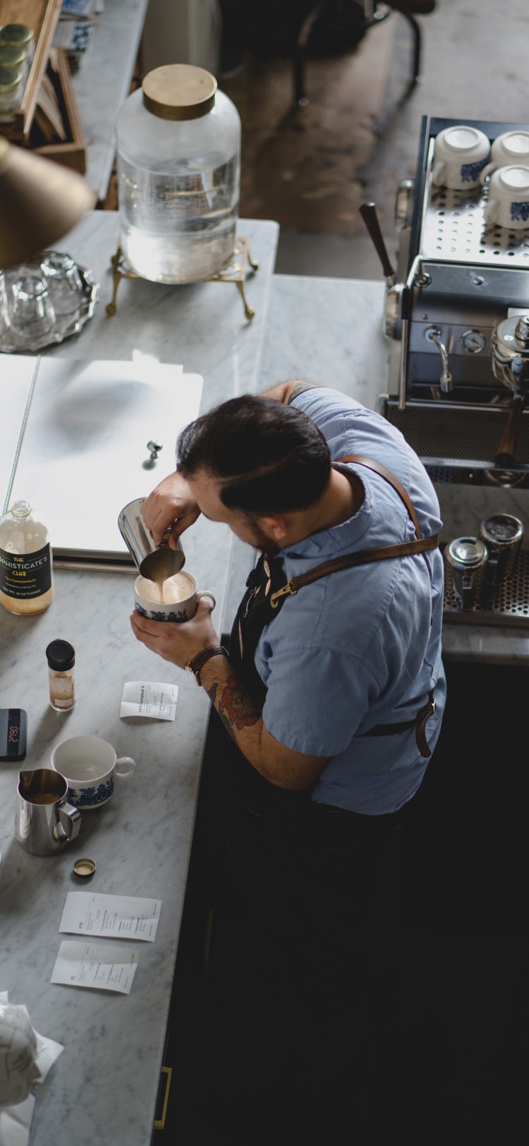 Barista making coffee